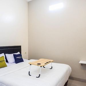 Urbanview Hotel Syariah John Sweet Home
